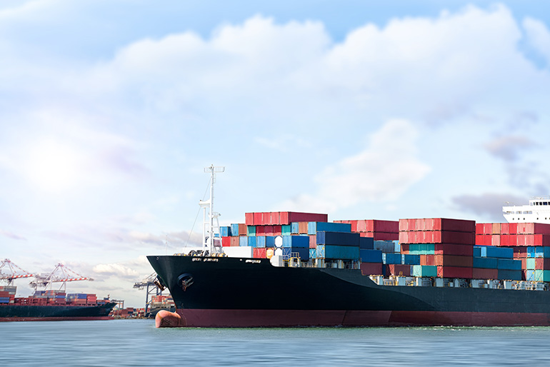 Cargo ship carrying multicolored shipping containers